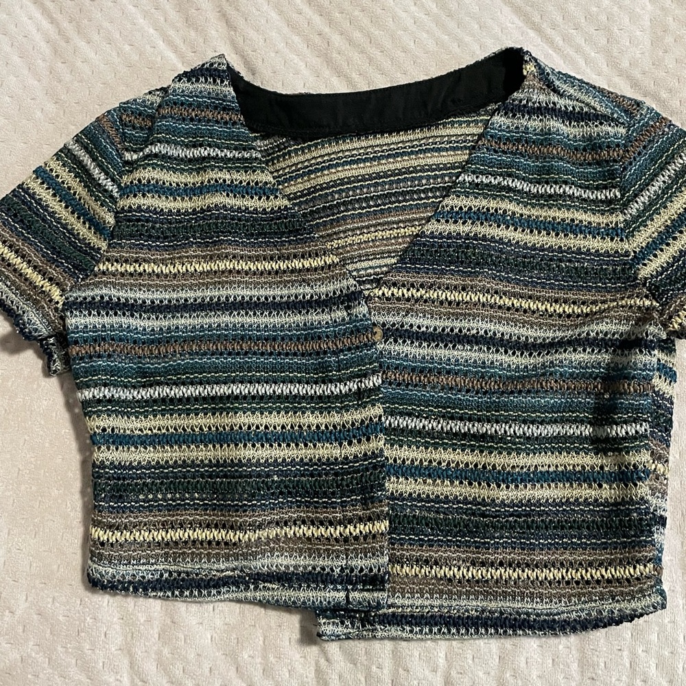 In great condition and super cute. Sad to part with this top